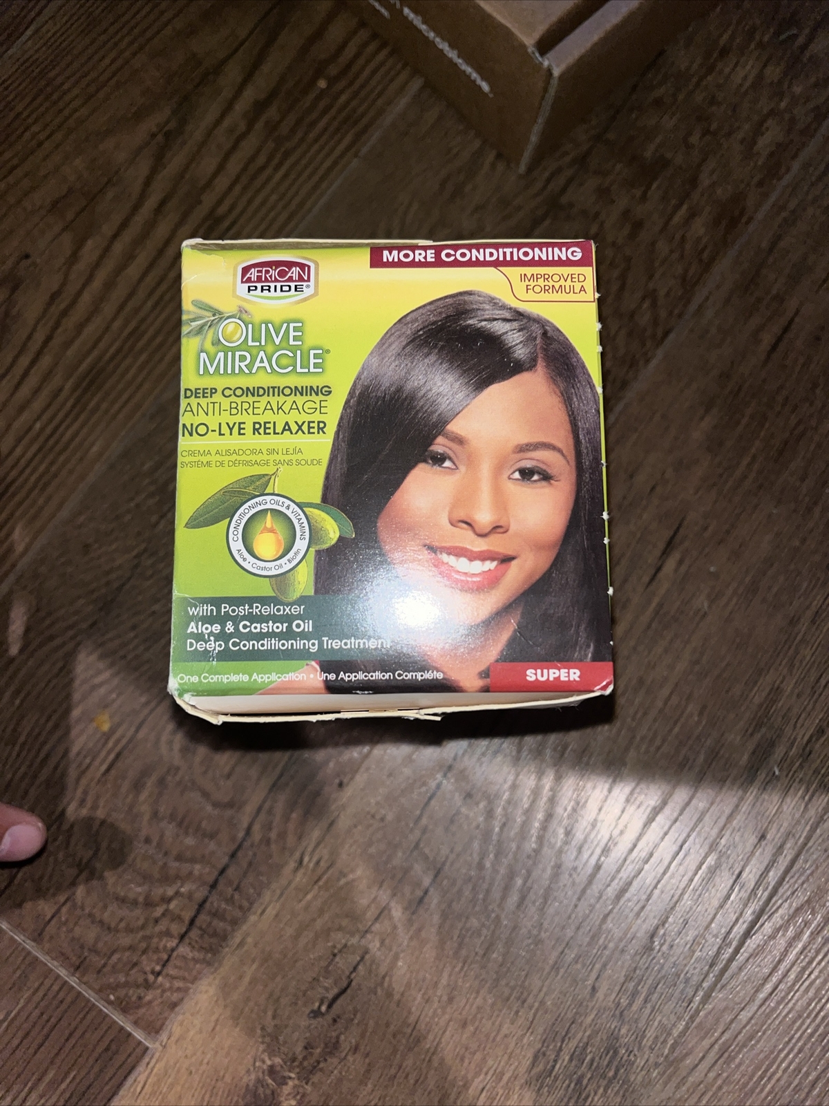 African Pride Olive Miracle Deep Conditioning Relaxer w/ Aloe & Castrol Oil.