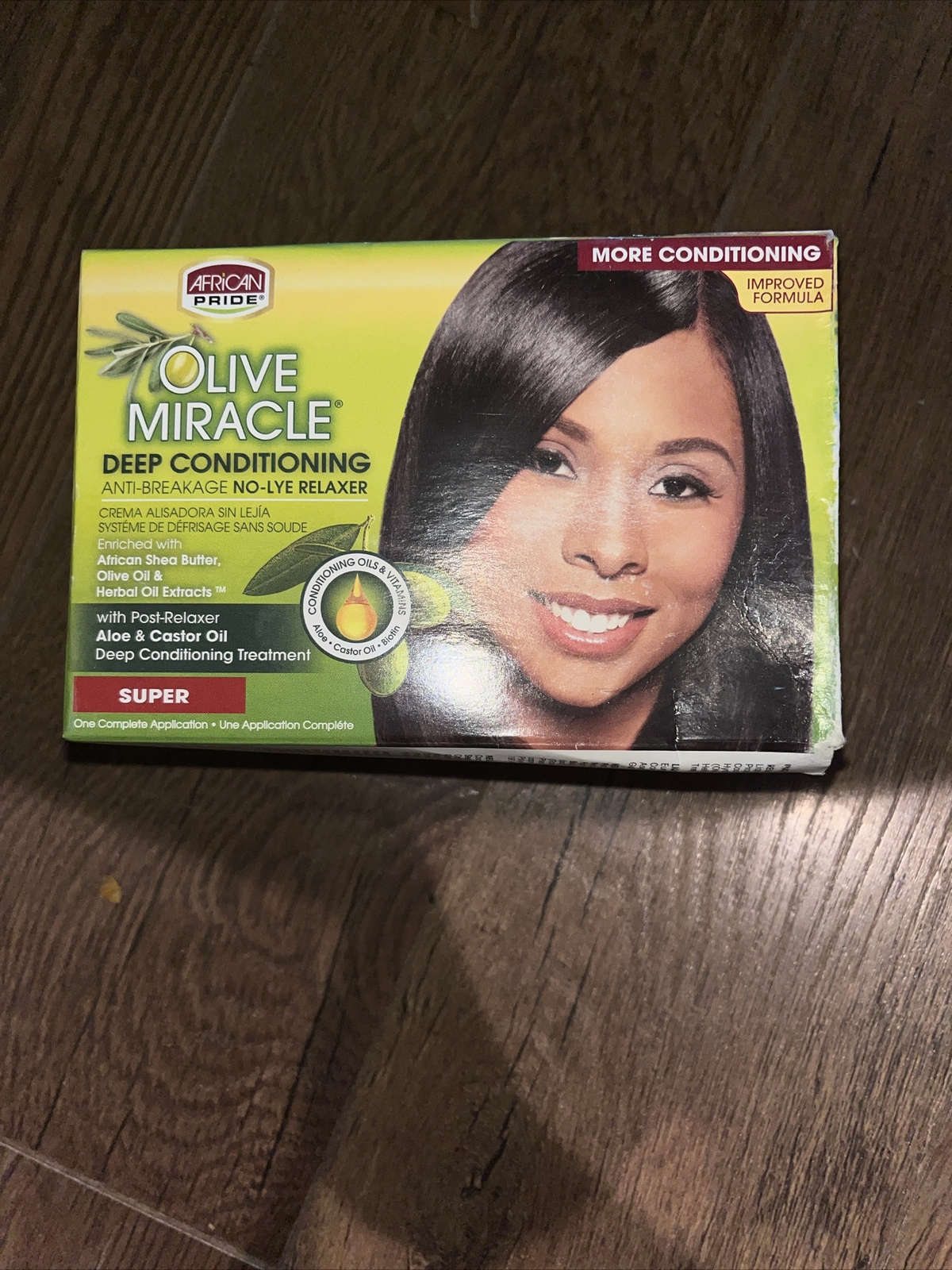 African Pride Olive Miracle Deep Conditioning Relaxer w/ Aloe & Castrol Oil.